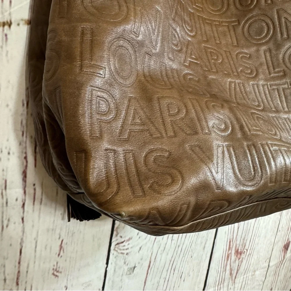 Louis Vuitton Paris Souple Whisper PM Chocolate Embossed leather bag limited
